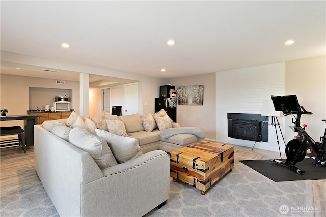 3415 Garden Ave N, Renton, WA 98056 - living room featuring recessed lighting