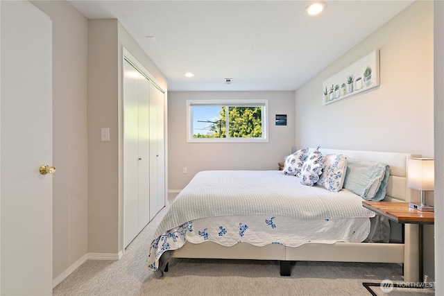 3415 Garden Ave N, Renton, WA 98056 - carpeted bedroom featuring baseboards, a closet, and recessed lighting