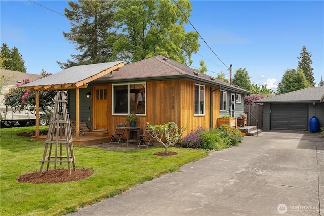 11008 2nd Ave S, Seattle, WA 98168 - view of front facade with a front yard, driveway, and a detached garage