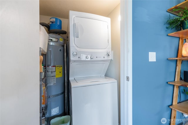 11008 2nd Ave S, Seattle, WA 98168 - washroom with stacked washer and clothes dryer and water heater
