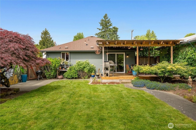 11008 2nd Ave S, Seattle, WA 98168 - rear view of property with a lawn and a patio