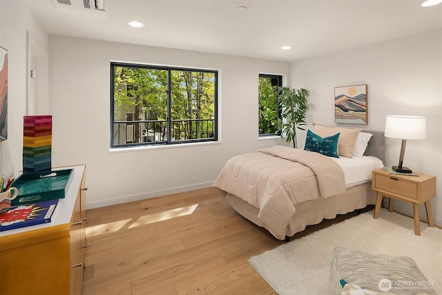 290 118th Ave SE, Bellevue, WA 98005 - bedroom with recessed lighting, light wood-style flooring, and baseboards