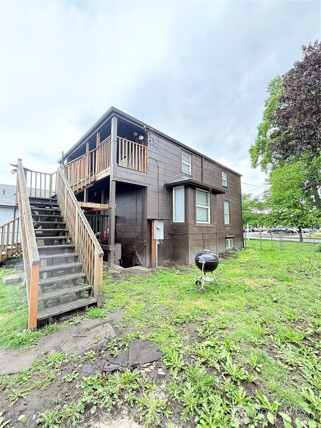 328 S Division St, Auburn, WA 98001 - back of house with stairway and a wooden deck