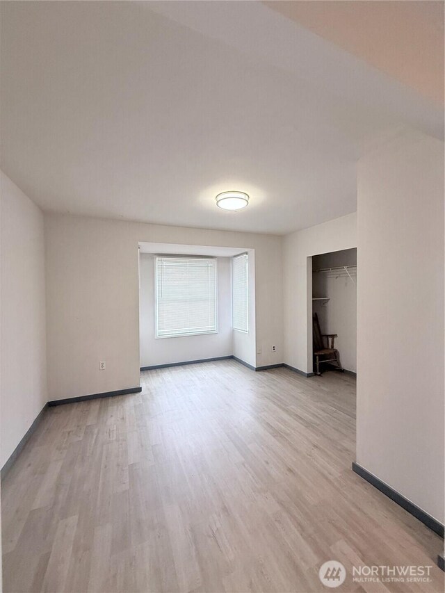 328 S Division St, Auburn, WA 98001 - empty room featuring light wood-style floors and baseboards