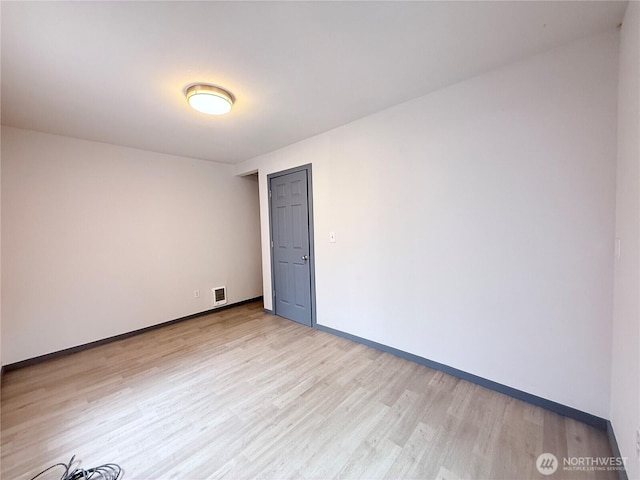328 S Division St, Auburn, WA 98001 - empty room featuring light wood-style floors and baseboards