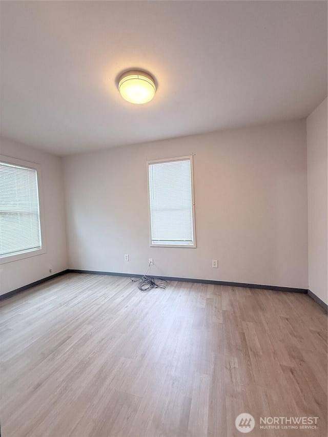 328 S Division St, Auburn, WA 98001 - unfurnished room featuring light wood-style flooring and baseboards