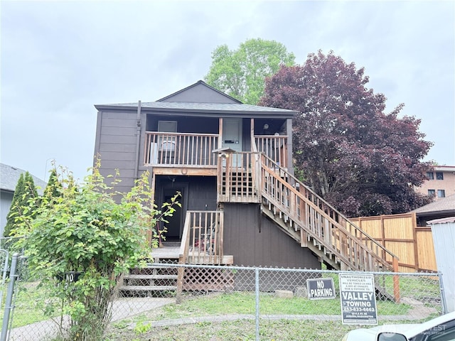 328 S Division St, Auburn, WA 98001 - view of front of house featuring stairway and a wooden deck