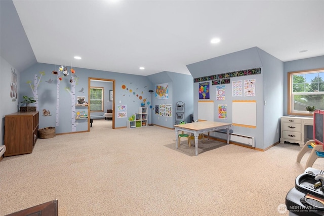 recreation room with baseboard heating, carpet, recessed lighting, baseboards, and lofted ceiling