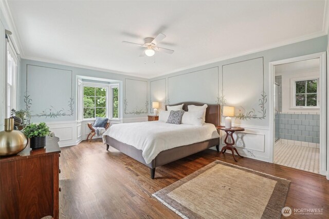 16255 38th Ave NE, Lake Forest Park, WA 98155 - bedroom with a decorative wall, crown molding, wood finished floors, a ceiling fan, and ensuite bathroom