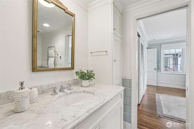 16255 38th Ave NE, Lake Forest Park, WA 98155 - bathroom with crown molding, wood finished floors, and vanity