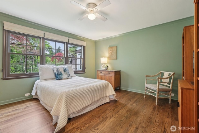 16255 38th Ave NE, Lake Forest Park, WA 98155 - bedroom with baseboards, dark wood finished floors, crown molding, and a ceiling fan