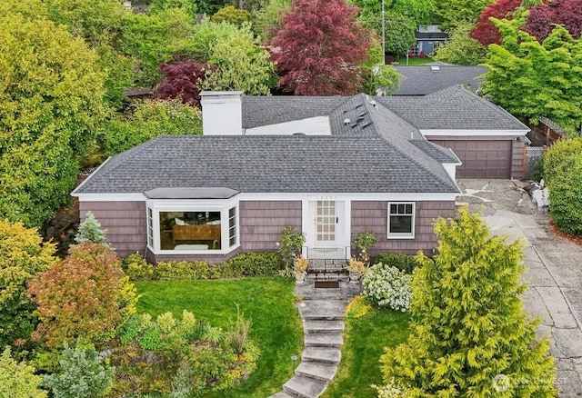 16255 38th Ave NE, Lake Forest Park, WA 98155 - view of front of home featuring roof with shingles, a chimney, entry steps, and a garage