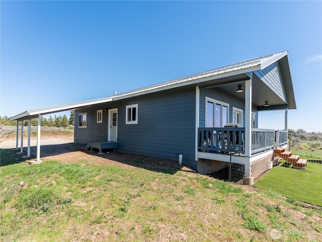 202 Chipmunk Trail Rd, East Wenatchee, WA 98802 - rear view of house with a lawn and metal roof
