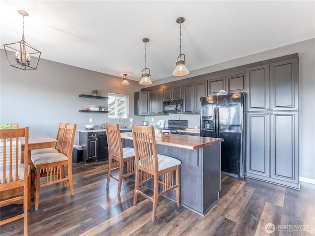 202 Chipmunk Trail Rd, East Wenatchee, WA 98802 - kitchen featuring black appliances, open shelves, a chandelier, dark wood finished floors, and a center island