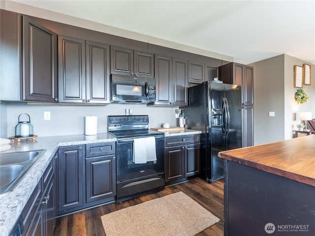 202 Chipmunk Trail Rd, East Wenatchee, WA 98802 - kitchen featuring black appliances, a sink, dark wood finished floors, and wood counters
