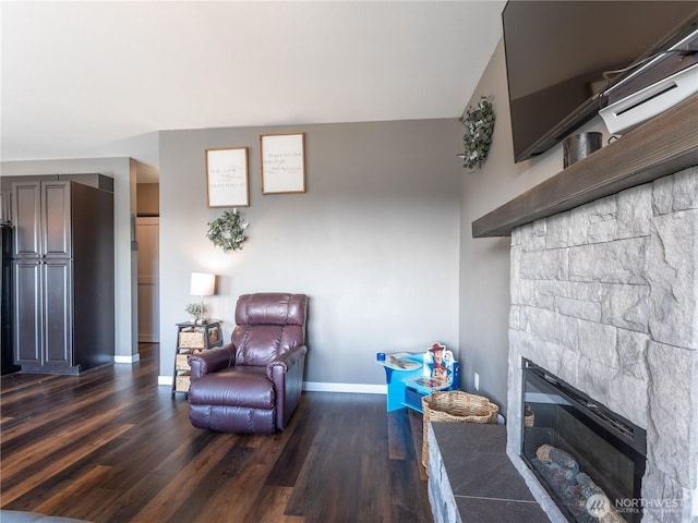 202 Chipmunk Trail Rd, East Wenatchee, WA 98802 - living area featuring baseboards, wood finished floors, and a tiled fireplace