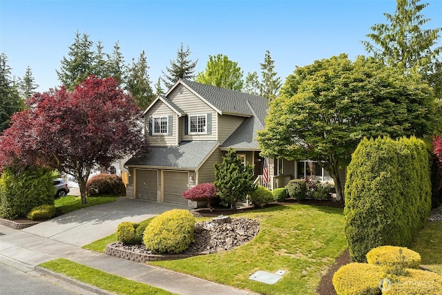 7725 Perregrine Pl, Arlington, WA 98223 - view of front of home with concrete driveway, a garage, a front yard, and a porch