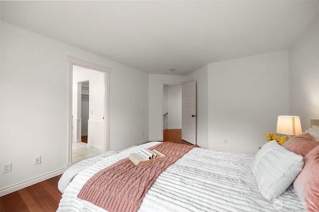 7725 Perregrine Pl, Arlington, WA 98223 - bedroom featuring baseboards and light wood-style flooring