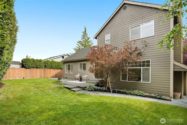 7725 Perregrine Pl, Arlington, WA 98223 - back of property with a patio area