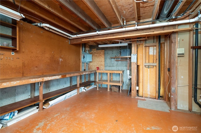 15127 Gibralter Rd, Anacortes, WA 98221 - unfinished below grade area with electric panel and a workshop area