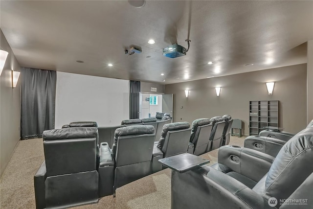 carpeted cinema featuring recessed lighting