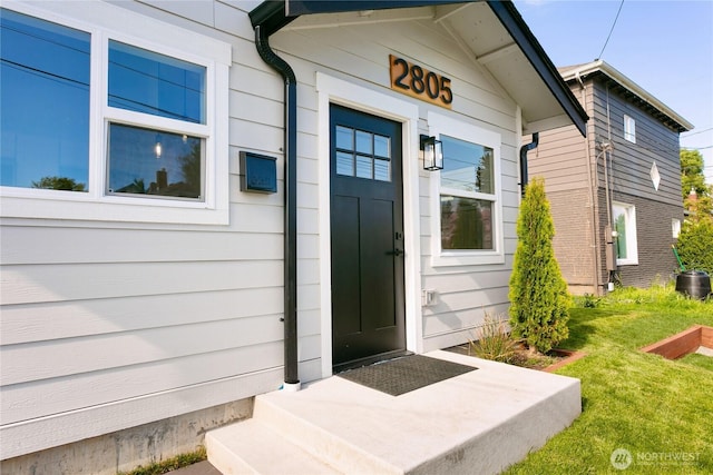 2805 S 11th St, Tacoma, WA 98405 - view of exterior entry featuring a yard and cooling unit