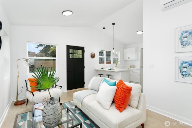 2805 S 11th St, Tacoma, WA 98405 - living area featuring an AC wall unit, vaulted ceiling, and baseboards