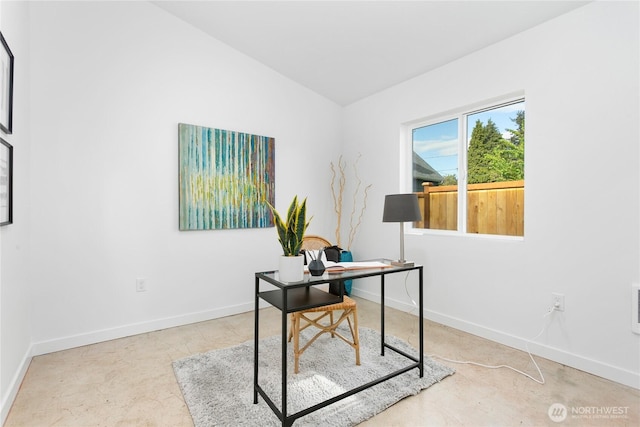 2805 S 11th St, Tacoma, WA 98405 - home office with baseboards, concrete floors, and lofted ceiling