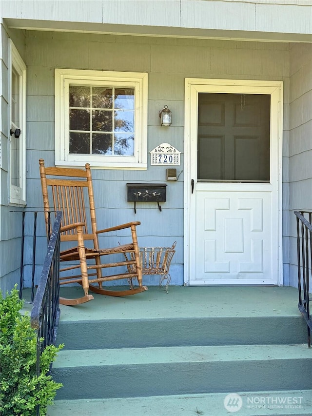 entrance to property with a porch