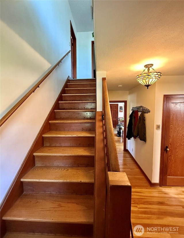 720 E Tremont St, Dayton, WA 99328 - stairs featuring wood finished floors and baseboards