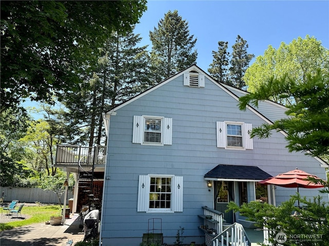 720 E Tremont St, Dayton, WA 99328 - rear view of house with stairway, fence, and a deck