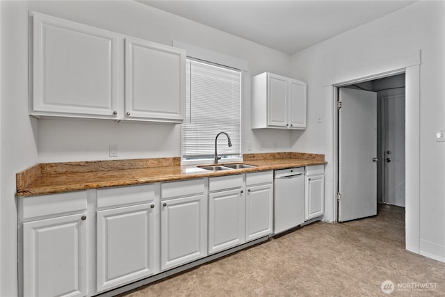 310 S 28th St, Tacoma, WA 98402 - kitchen featuring a sink, white cabinetry, and white dishwasher