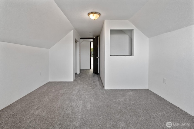 310 S 28th St, Tacoma, WA 98402 - bonus room featuring carpet floors and vaulted ceiling