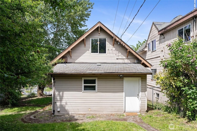 310 S 28th St, Tacoma, WA 98402 - rear view of house featuring roof with shingles