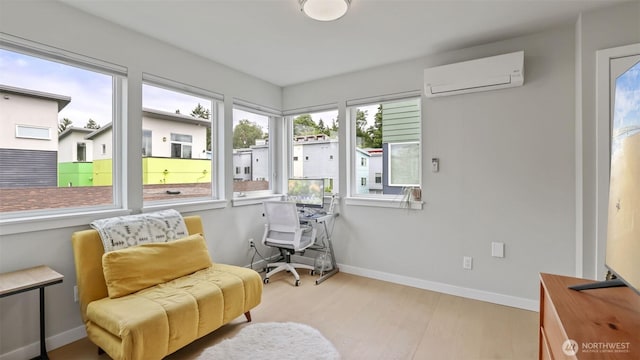 sunroom / solarium featuring a wall mounted air conditioner