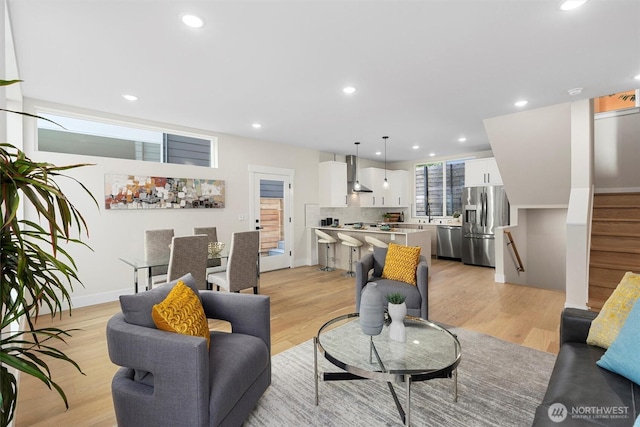 1319 14th Ave S Unit B, Seattle, WA 98144 - living area with stairway, recessed lighting, light wood finished floors, and baseboards