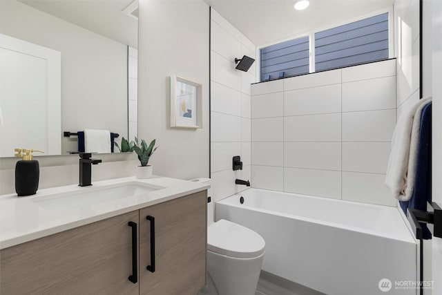 1319 14th Ave S Unit B, Seattle, WA 98144 - bathroom featuring toilet, vanity, shower / tub combination, and recessed lighting