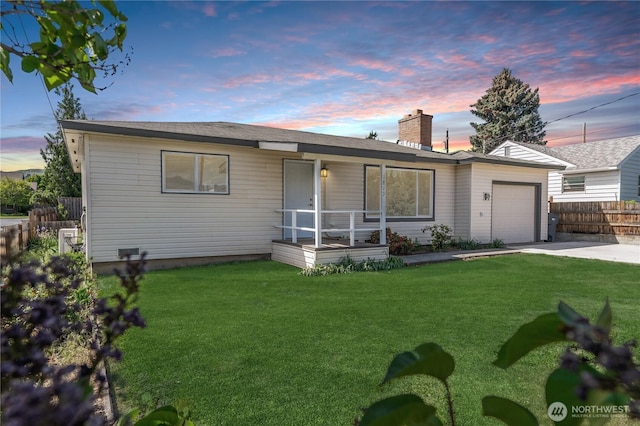 1819 Springwater Ave, Wenatchee, WA 98801 - ranch-style house with an attached garage, driveway, a chimney, and a porch
