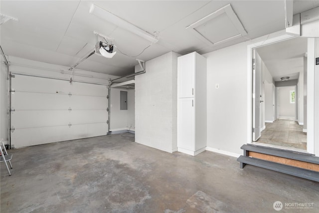 1819 Springwater Ave, Wenatchee, WA 98801 - garage featuring a garage door opener and electric panel