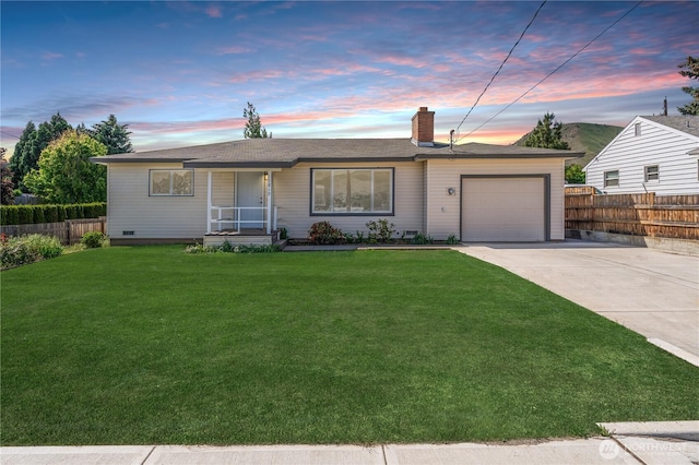 1819 Springwater Ave, Wenatchee, WA 98801 - single story home with a garage, concrete driveway, and a chimney