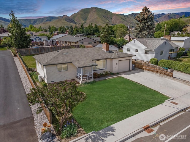 1819 Springwater Ave, Wenatchee, WA 98801 - single story home featuring driveway, a residential view, a garage, and a mountain view