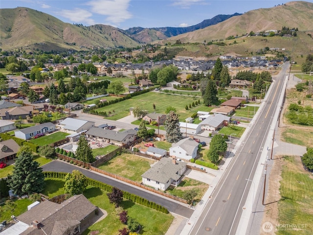 1819 Springwater Ave, Wenatchee, WA 98801 - aerial overview of property's location featuring nearby suburban area and a mountain backdrop