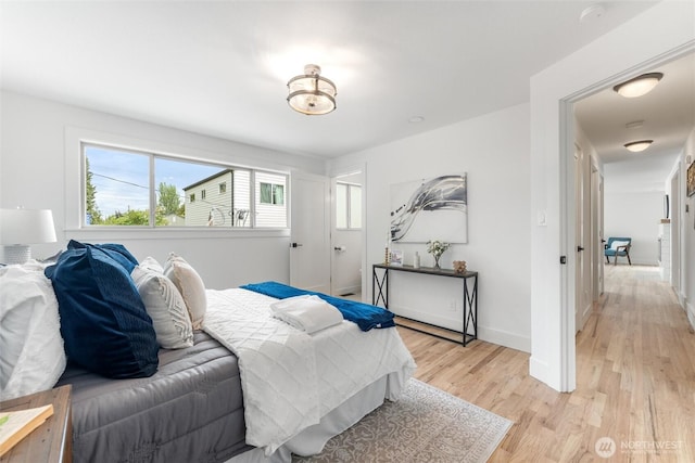 11242 Fremont Ave N Unit B, Seattle, WA 98133 - bedroom featuring light wood-style floors and baseboards