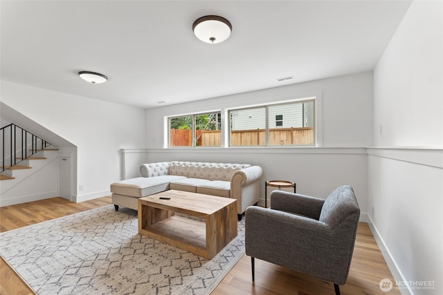 11242 Fremont Ave N Unit B, Seattle, WA 98133 - living room with wood finished floors, stairs, and baseboards