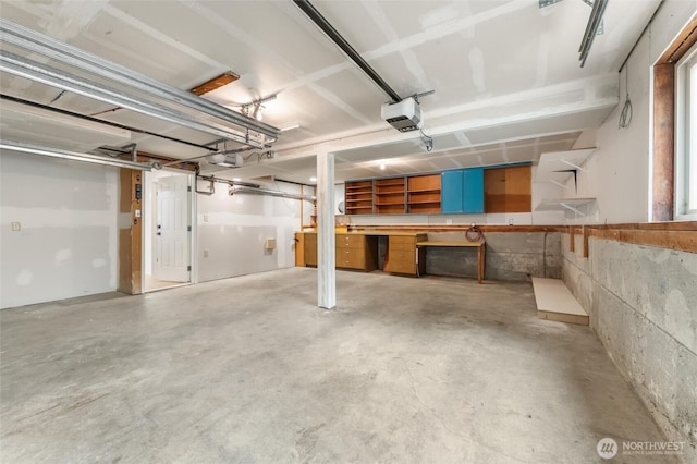 11242 Fremont Ave N Unit B, Seattle, WA 98133 - garage featuring a garage door opener