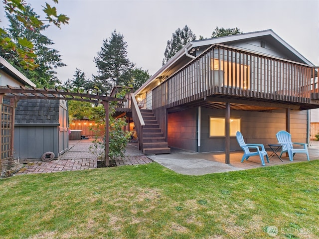 11242 Fremont Ave N Unit B, Seattle, WA 98133 - back of property with a patio, a deck, a storage unit, and stairs