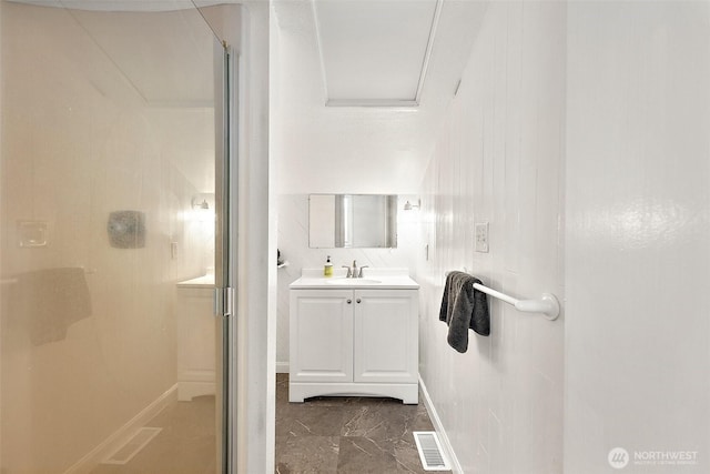 1812 5th St SE, Puyallup, WA 98372 - bathroom with a shower stall, vanity, and baseboards