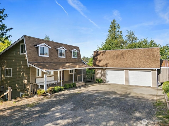 1812 5th St SE, Puyallup, WA 98372 - view of front of property featuring gravel driveway, a porch, and an outbuilding