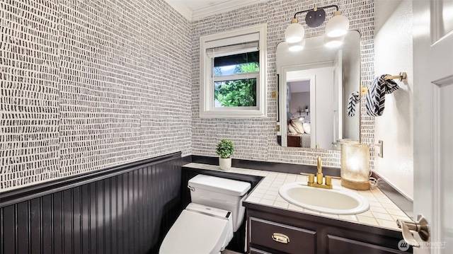 4017 239th Pl SE, Sammamish, WA 98029 - bathroom with toilet, vanity, and ornamental molding