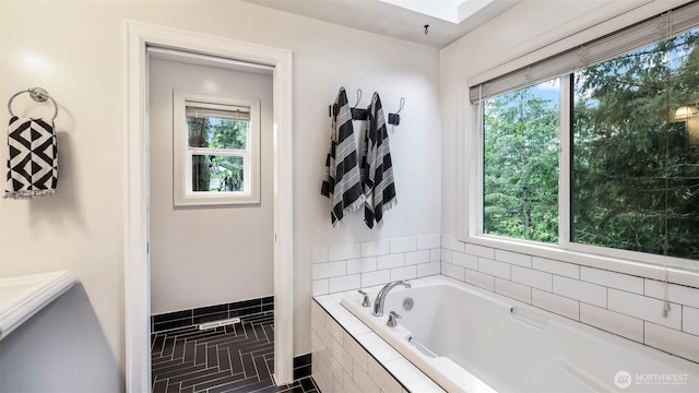 4017 239th Pl SE, Sammamish, WA 98029 - bathroom with plenty of natural light, a bath, and tile patterned flooring